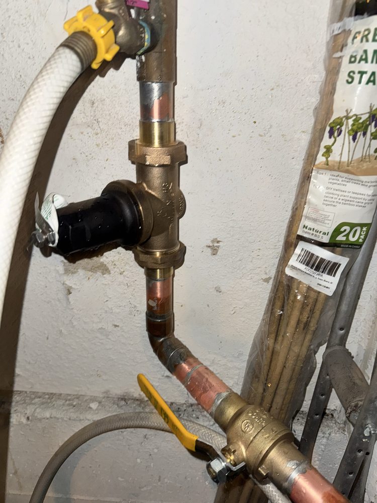 Backflow preventer and hose bib assembly installed by 5Star Plumbing Trenchless
