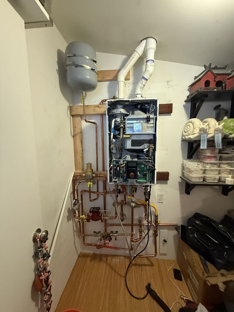 Tankless water heater installed with expansion tank and copper gas and water lines by 5Star Plumbing Trenchless